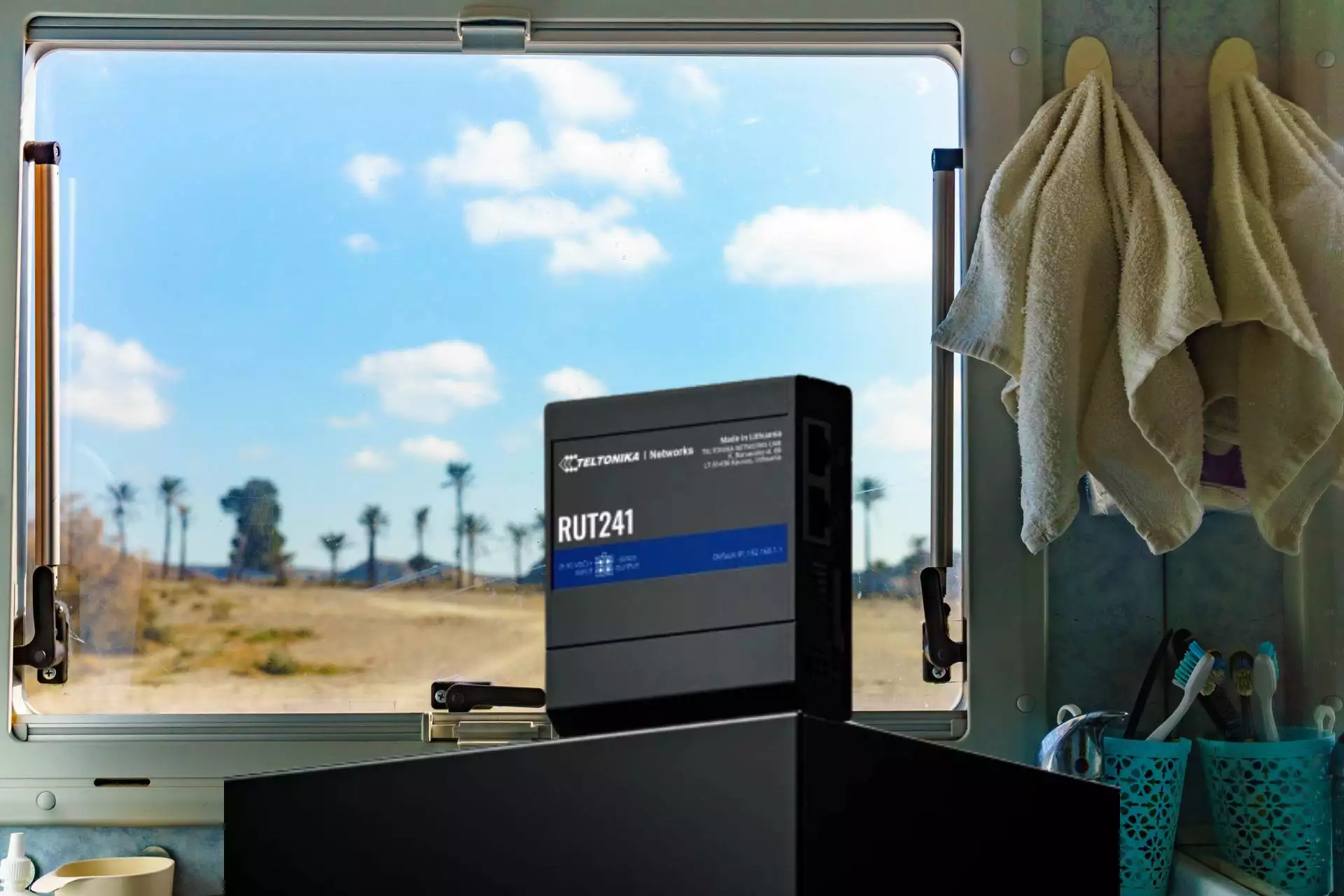 eSIM Router in RV with desert view
